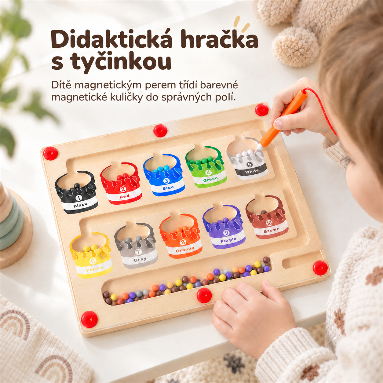 Ez a didaktikus játék egy pálcikával rendelkezik, amelyet a gyermek arra használ, hogy a színes mágneses golyókat a megfelelő dobozokba rendezze!